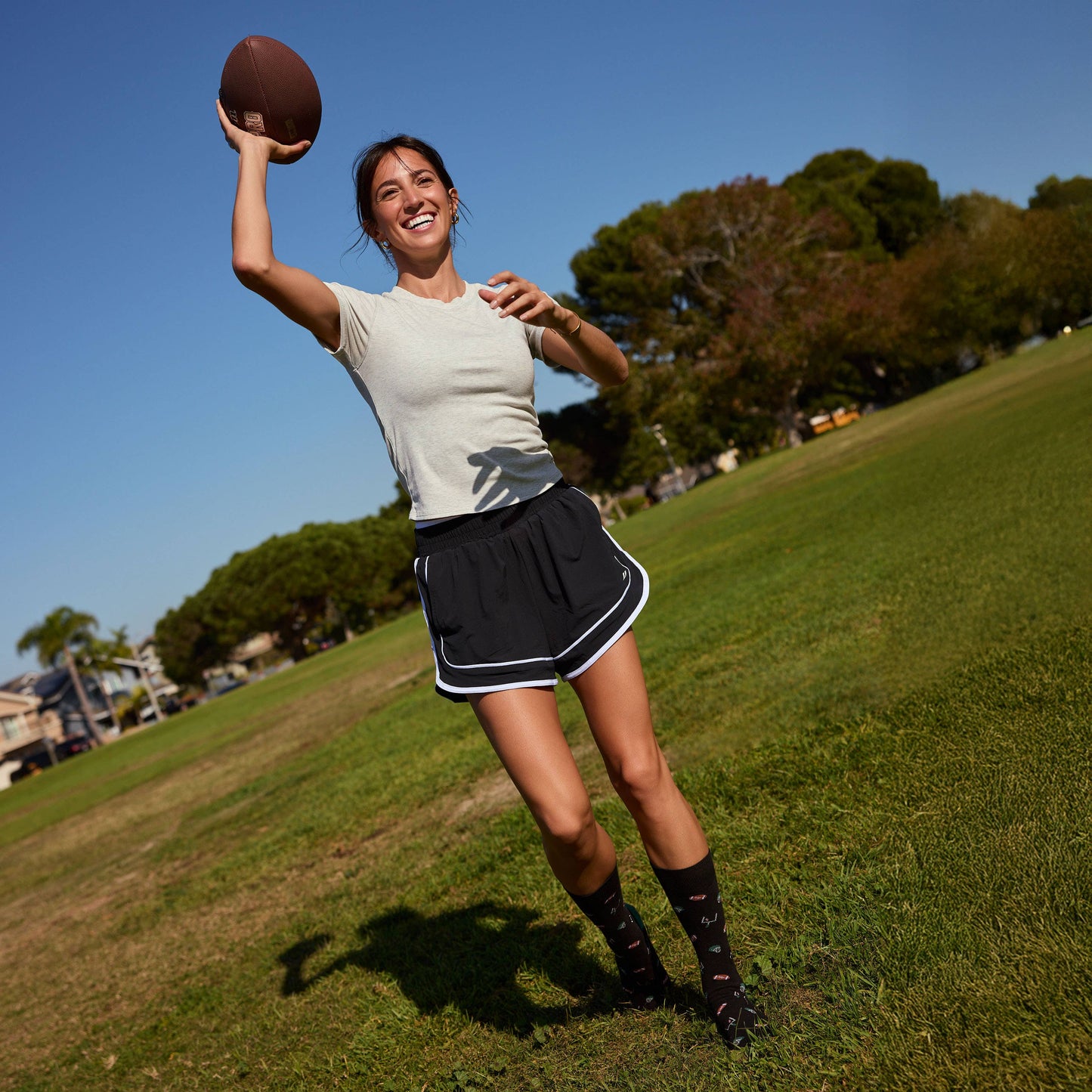 Conscious Step - Socks that Support Youth Sports | Black Footballs
