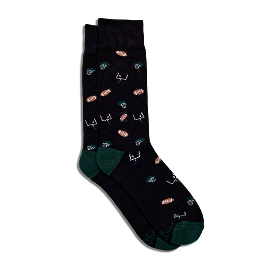 Conscious Step - Socks that Support Youth Sports | Black Footballs