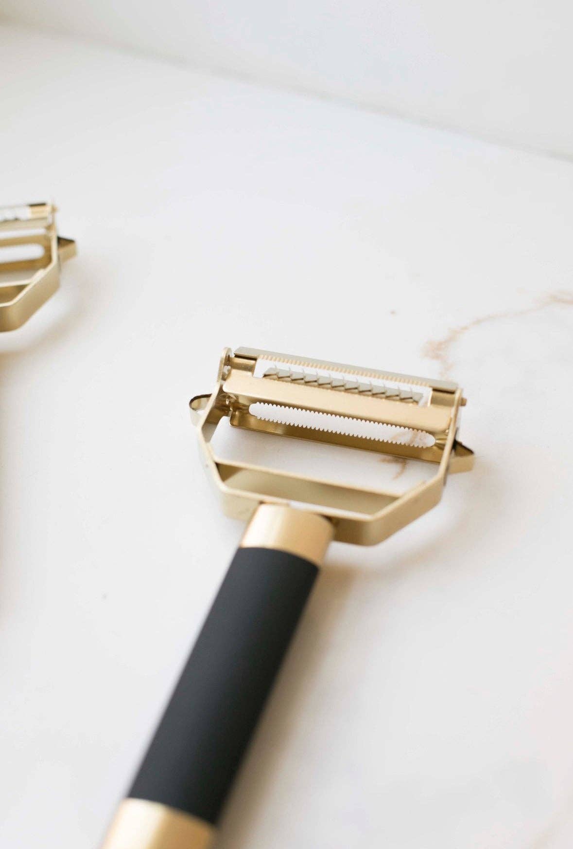 Atelier Black and Gold Peeler