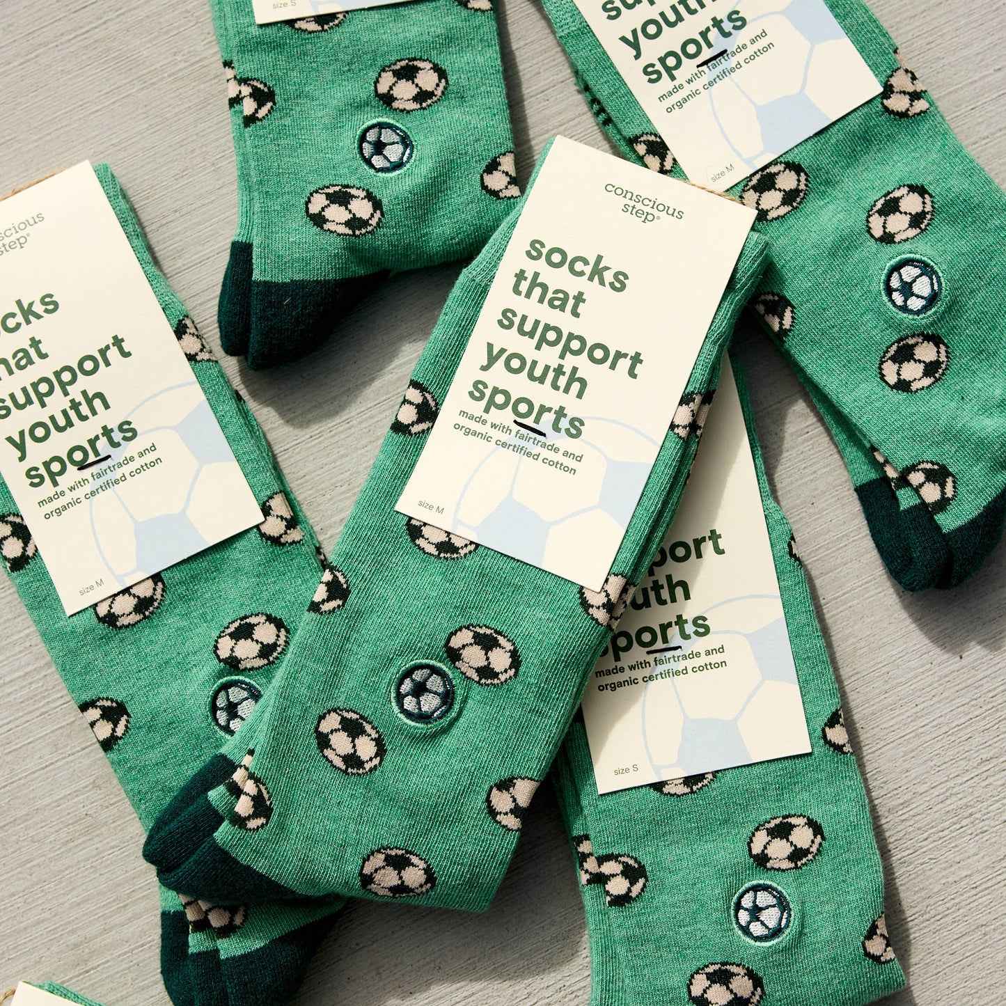 Conscious Step - Socks that Support Youth Sports | Green Soccer Balls